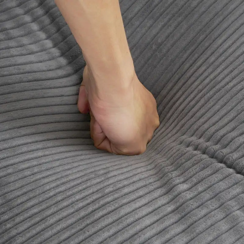 Canapé d'angle modulable en velours côtelé avec poches de rangement latérales